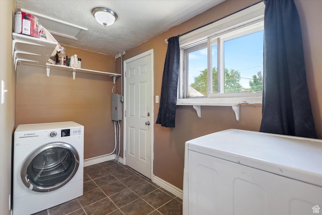 80 S 400 E, Clearfield, UT 84015 - laundry area with separate washer and dryer, baseboards, dark tile patterned flooring, attic access, and a textured ceiling