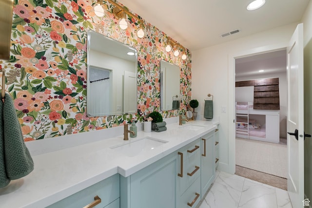 1446 E Anvil Dr, Draper, UT 84020 - full bathroom featuring double vanity, recessed lighting, wallpapered walls, and marble finish floors