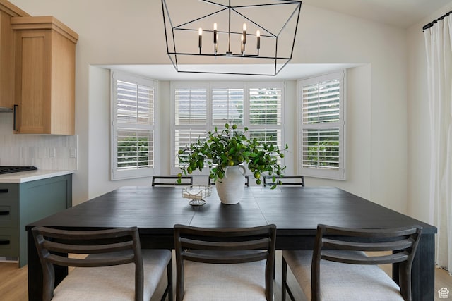 1446 E Anvil Dr, Draper, UT 84020 - dining area featuring light wood-style flooring and a chandelier