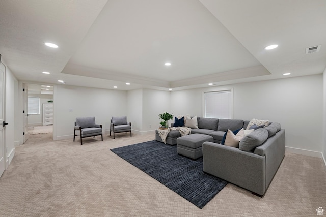 1446 E Anvil Dr, Draper, UT 84020 - living area with a tray ceiling, light colored carpet, recessed lighting, and baseboards