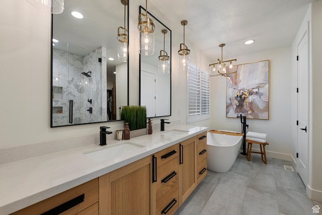 1446 E Anvil Dr, Draper, UT 84020 - bathroom featuring a stall shower, double vanity, a soaking tub, a chandelier, and recessed lighting