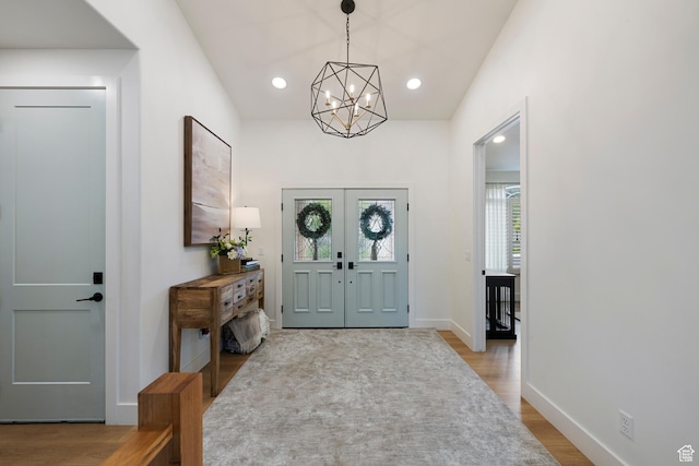 1446 E Anvil Dr, Draper, UT 84020 - foyer entrance with a chandelier, wood finished floors, baseboards, french doors, and recessed lighting