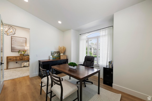 1446 E Anvil Dr, Draper, UT 84020 - office featuring light wood-type flooring, recessed lighting, baseboards, vaulted ceiling, and a chandelier