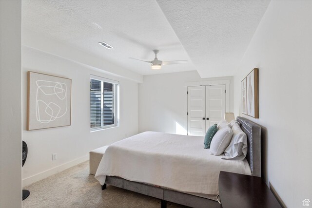 4307 N La Ringhiera Dr, Lehi, UT 84043 - bedroom with a textured ceiling, carpet floors, baseboards, and ceiling fan