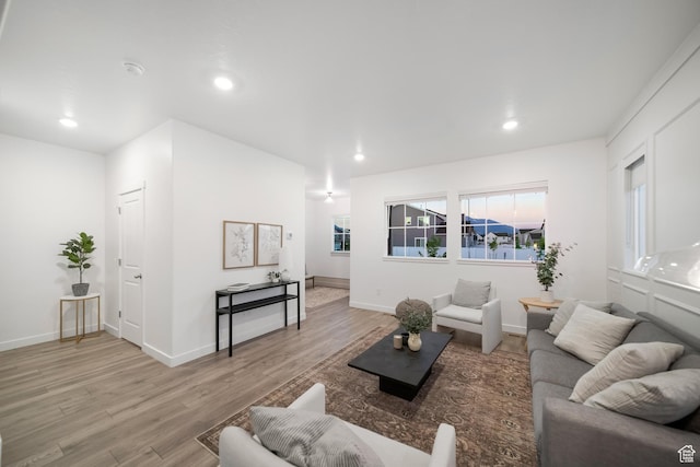 473 N Northshore Dr, Saratoga Springs, UT 84045 - living room with light wood finished floors, recessed lighting, and baseboards