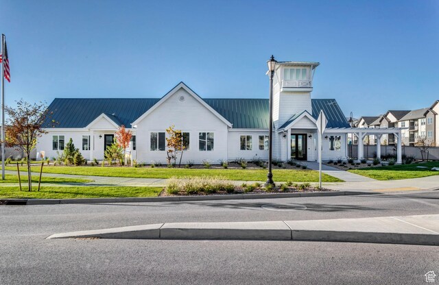 473 N Northshore Dr, Saratoga Springs, UT 84045 - view of front of house featuring a front yard and metal roof