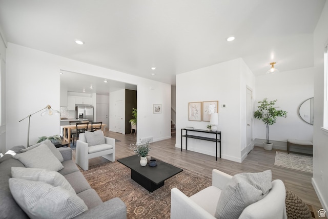 473 N Northshore Dr, Saratoga Springs, UT 84045 - living area with light wood-type flooring, recessed lighting, and baseboards