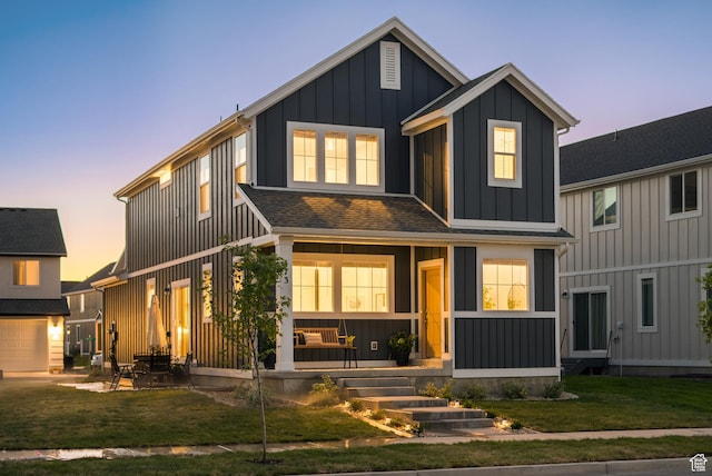 473 N Northshore Dr, Saratoga Springs, UT 84045 - modern inspired farmhouse with board and batten siding, a yard, a shingled roof, and a porch