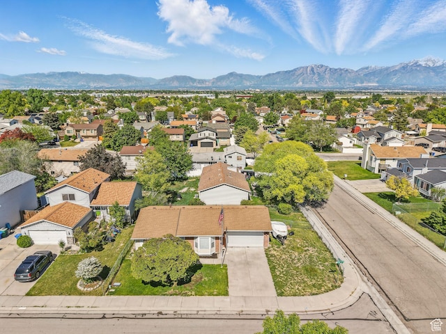 6813 S Sparrowtail Rd, West Jordan, UT 84081 - aerial perspective of suburban area featuring a mountain backdrop