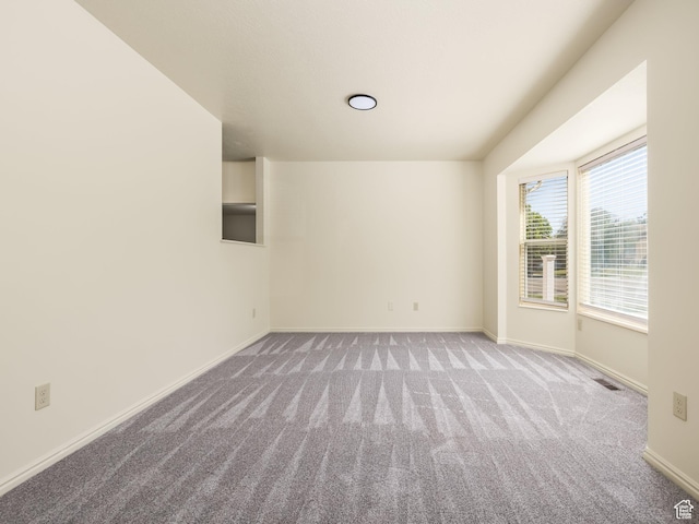 6813 S Sparrowtail Rd, West Jordan, UT 84081 - carpeted empty room with baseboards