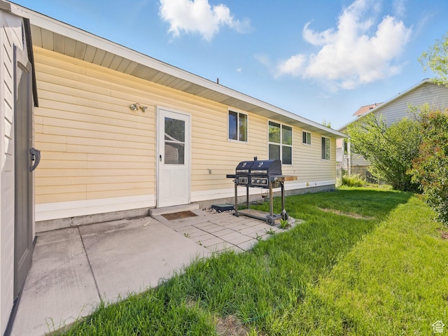 6813 S Sparrowtail Rd, West Jordan, UT 84081 - back of property with a yard and a patio area