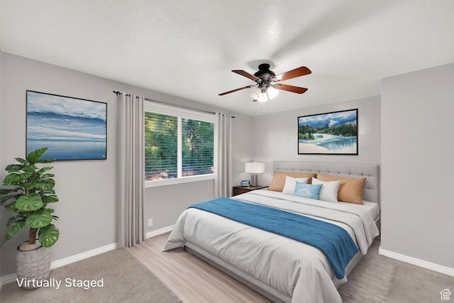 1543 Mulberry Way, Sandy, UT 84093 - bedroom with baseboards, light carpet, and ceiling fan