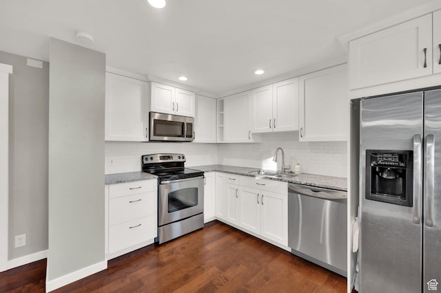 1543 Mulberry Way, Sandy, UT 84093 - kitchen featuring stainless steel appliances, a sink, light stone counters, white cabinetry, and recessed lighting