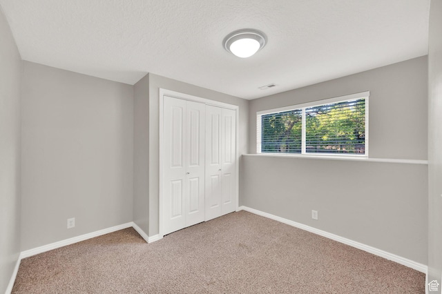 1543 Mulberry Way, Sandy, UT 84093 - unfurnished bedroom featuring carpet flooring, a closet, and baseboards