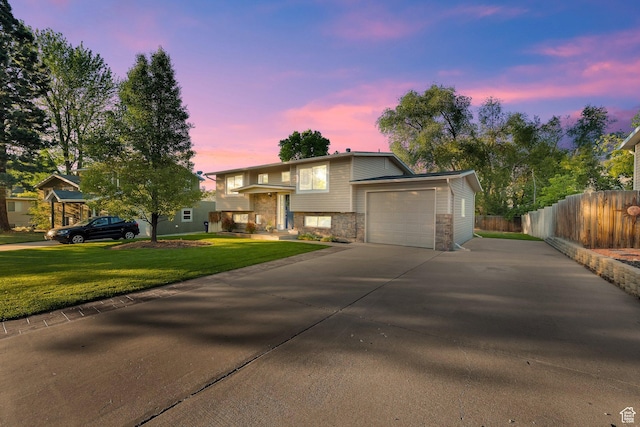 1543 Mulberry Way, Sandy, UT 84093 - view of front of home with stone siding, driveway, and a garage