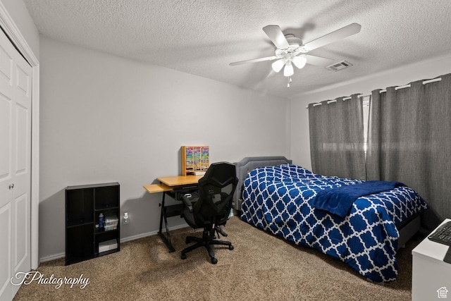 840 S 400 E Unit 46, St George, UT 84770 - carpeted bedroom featuring a closet, ceiling fan, a textured ceiling, and baseboards