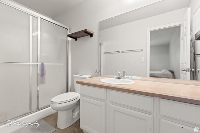 840 S 400 E Unit 46, St George, UT 84770 - ensuite bathroom with a shower stall, vanity, toilet, and tile patterned floors