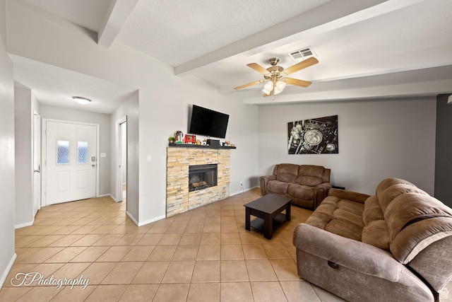 840 S 400 E Unit 46, St George, UT 84770 - living area featuring light tile patterned flooring, beam ceiling, ceiling fan, a fireplace, and baseboards