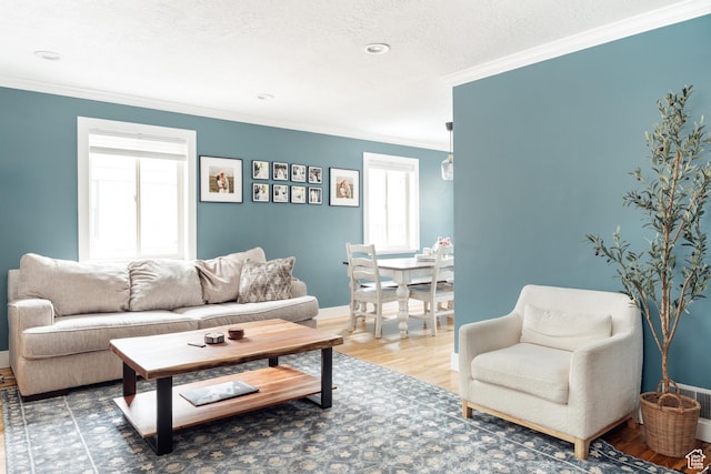 1584 E 3045 S, Salt Lake City, UT 84106 - living room featuring ornamental molding, wood finished floors, and baseboards