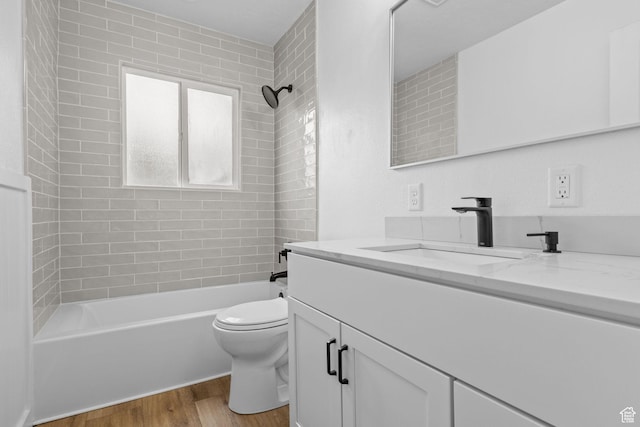 598 Brookside Dr, Springville, UT 84663 - full bath with vanity, wood finished floors, toilet, and tub / shower combination