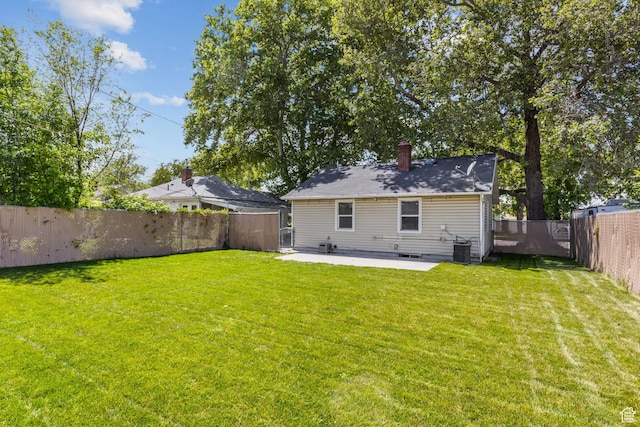 598 Brookside Dr, Springville, UT 84663 - back of property featuring a patio area, a chimney, and cooling unit