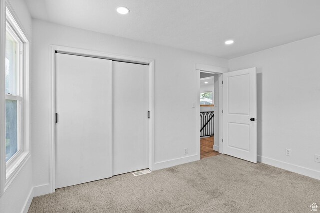 598 Brookside Dr, Springville, UT 84663 - unfurnished bedroom with carpet, recessed lighting, baseboards, and a closet