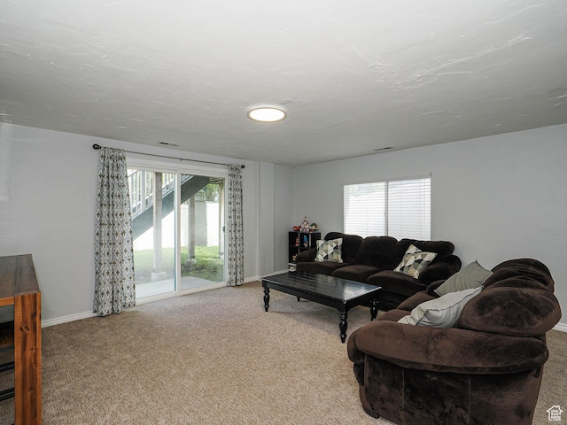 67 N Archmore St, Saratoga Springs, UT 84043 - living area featuring plenty of natural light, carpet flooring, and baseboards