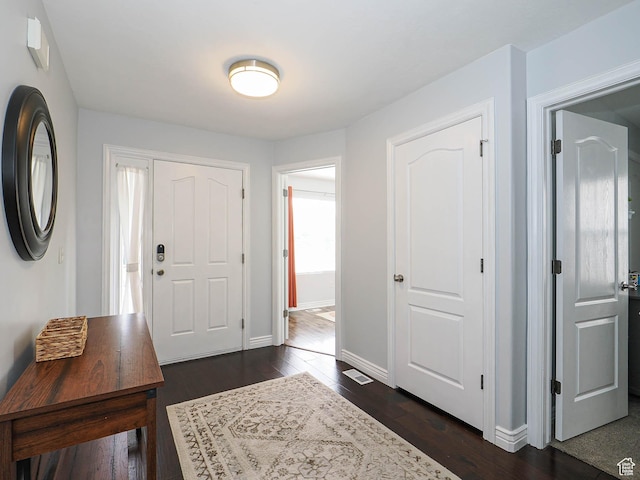 67 N Archmore St, Saratoga Springs, UT 84043 - foyer entrance featuring dark wood-style floors and baseboards