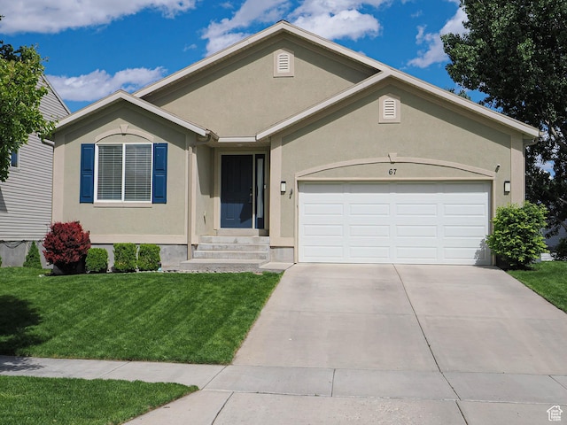 67 N Archmore St, Saratoga Springs, UT 84043 - ranch-style home with a garage, stucco siding, a front yard, and driveway