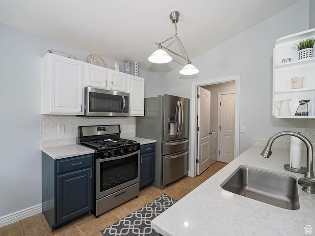 67 N Archmore St, Saratoga Springs, UT 84043 - kitchen featuring stainless steel appliances, a sink, white cabinetry, tasteful backsplash, and pendant lighting