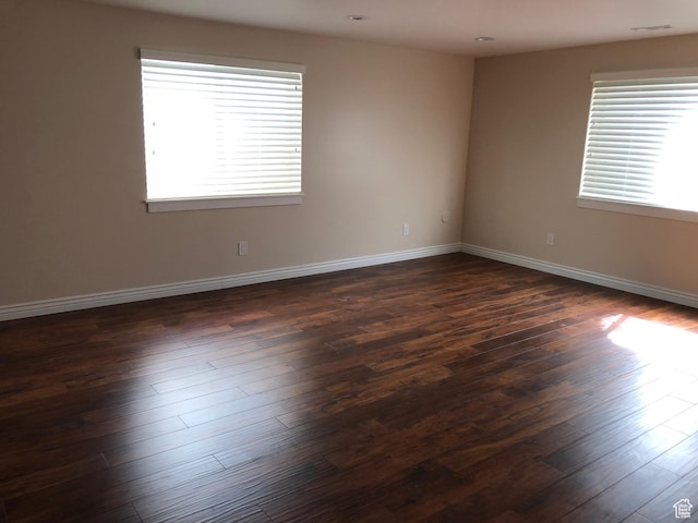 3681 W 775 N, Layton, UT 84041 - unfurnished room with healthy amount of natural light, dark wood finished floors, and baseboards