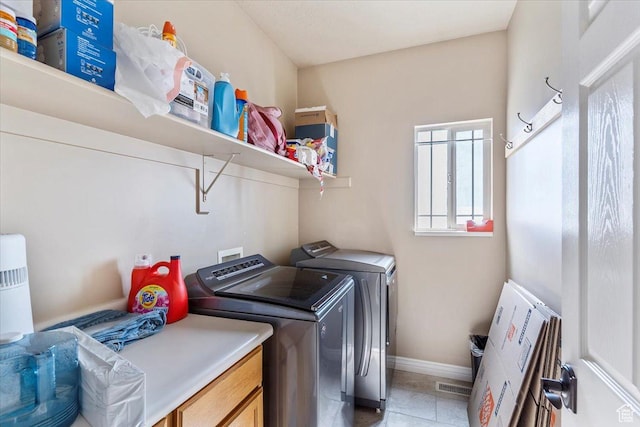 3681 W 775 N, Layton, UT 84041 - laundry area with separate washer and dryer, baseboards, and light tile patterned floors