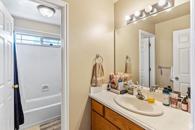 3681 W 775 N, Layton, UT 84041 - bathroom featuring vanity and shower / bath combination
