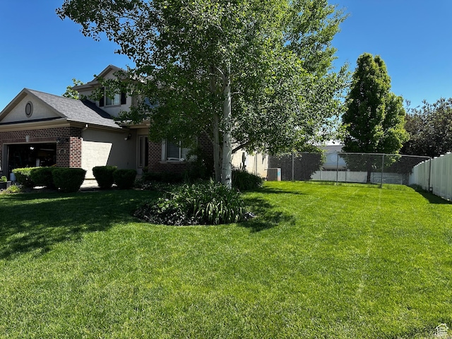 3681 W 775 N, Layton, UT 84041 - view of yard featuring a garage