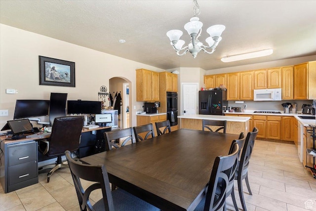 3681 W 775 N, Layton, UT 84041 - dining space with arched walkways, a chandelier, and light tile patterned flooring