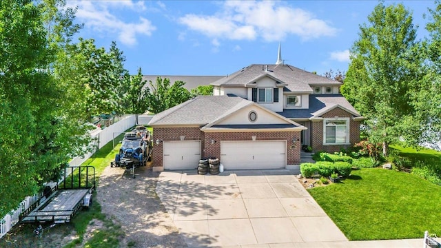 3681 W 775 N, Layton, UT 84041 - view of front of home featuring an attached garage, driveway, and brick siding