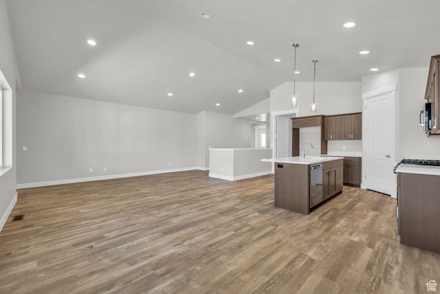 2711 S Allison Way Unit 101, Syracuse, UT 84075 - kitchen with a center island with sink, open floor plan, light countertops, light wood-style flooring, and recessed lighting