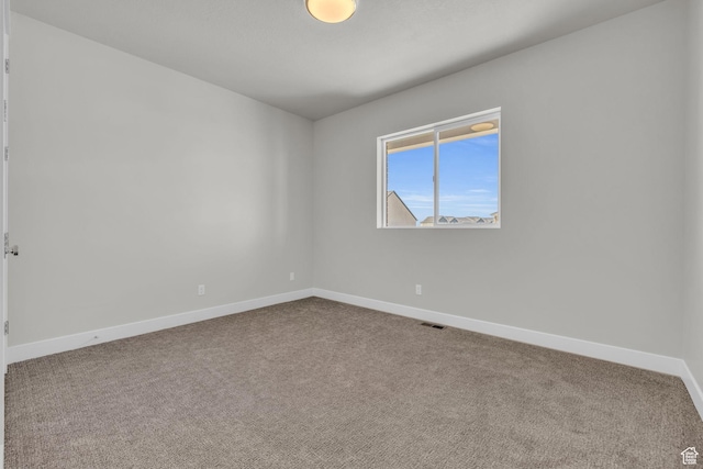 2711 S Allison Way Unit 101, Syracuse, UT 84075 - carpeted spare room with baseboards