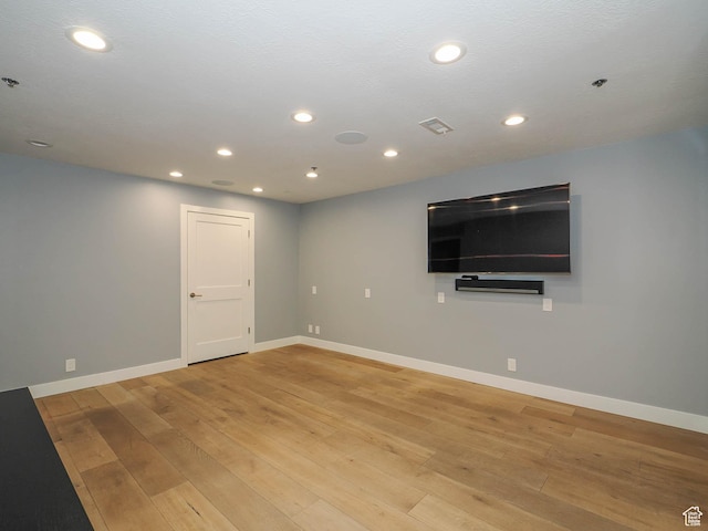 48 W 300 S Unit 2502-N, Salt Lake City, UT 84101 - below grade area featuring light wood-type flooring, baseboards, and recessed lighting