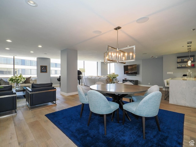 48 W 300 S Unit 2502-N, Salt Lake City, UT 84101 - dining room with a chandelier, wood finished floors, baseboards, and recessed lighting