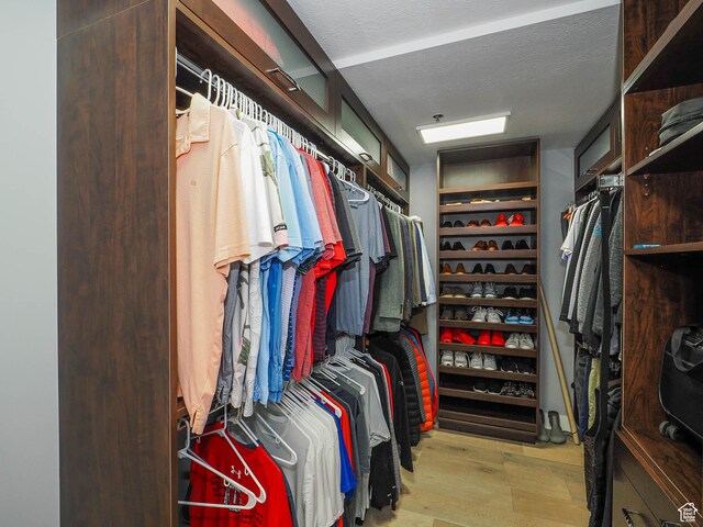 48 W 300 S Unit 2502-N, Salt Lake City, UT 84101 - walk in closet featuring wood finished floors