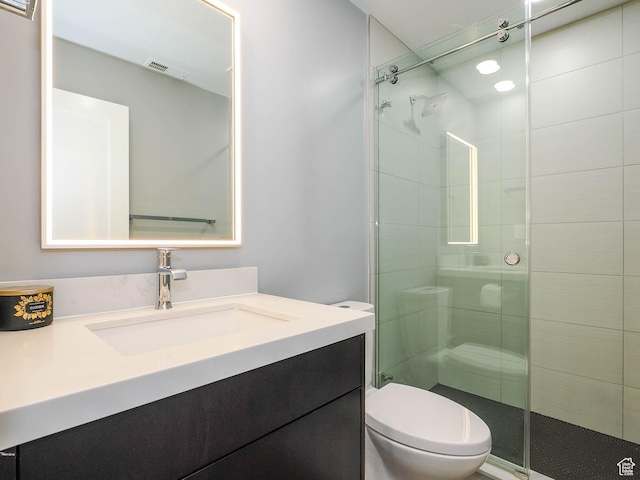 48 W 300 S Unit 2502-N, Salt Lake City, UT 84101 - bathroom with toilet, vanity, and a stall shower
