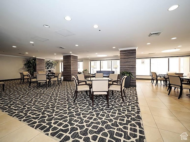 48 W 300 S Unit 2502-N, Salt Lake City, UT 84101 - dining space featuring light tile patterned floors, ornate columns, plenty of natural light, recessed lighting, and ornamental molding