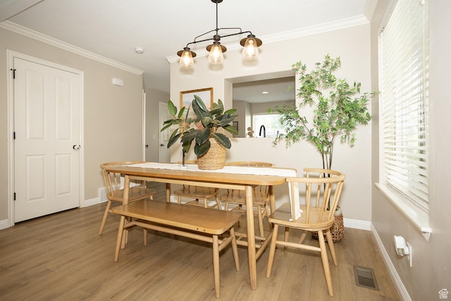 1908 W 1020 N, Provo, UT 84604 - dining space featuring light wood-style flooring, ornamental molding, baseboards, and a chandelier