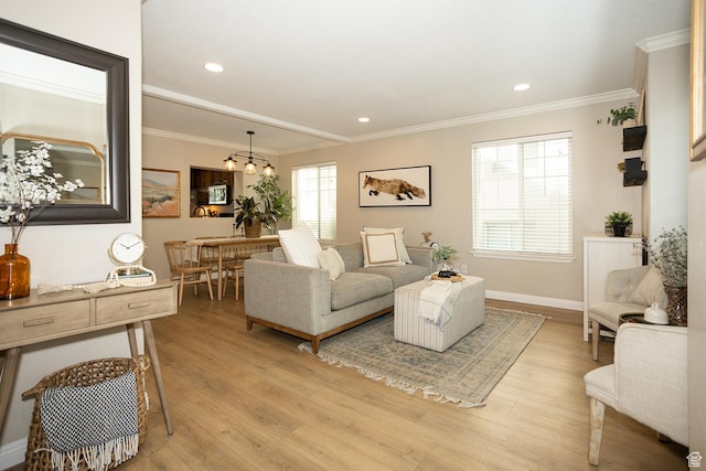 1908 W 1020 N, Provo, UT 84604 - living room with light wood finished floors, crown molding, baseboards, a chandelier, and recessed lighting