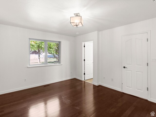 1206 W 3300 N, Pleasant Grove, UT 84062 - empty room with wood finished floors and baseboards