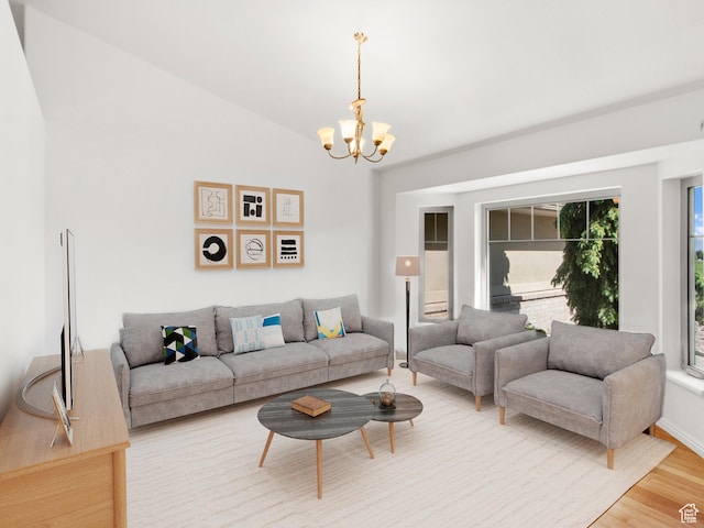 1206 W 3300 N, Pleasant Grove, UT 84062 - living area featuring a chandelier, light wood-style floors, and vaulted ceiling