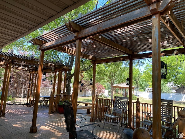 1206 W 3300 N, Pleasant Grove, UT 84062 - deck with a pergola, a fenced backyard, and outdoor dining space