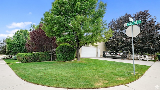 10205 N 3900 W, Cedar Hills, UT 84062 - view of home's exterior featuring a garage, a yard, and driveway