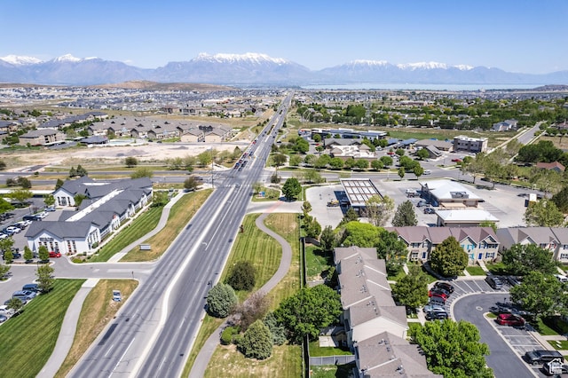 3421 E Dundee Dr, Eagle Mountain, UT 84005 - aerial view of residential area featuring mountains and a major roadway